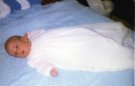 1973-03-04-Justin-Baptism-GreatGrScott'sGown.JPG