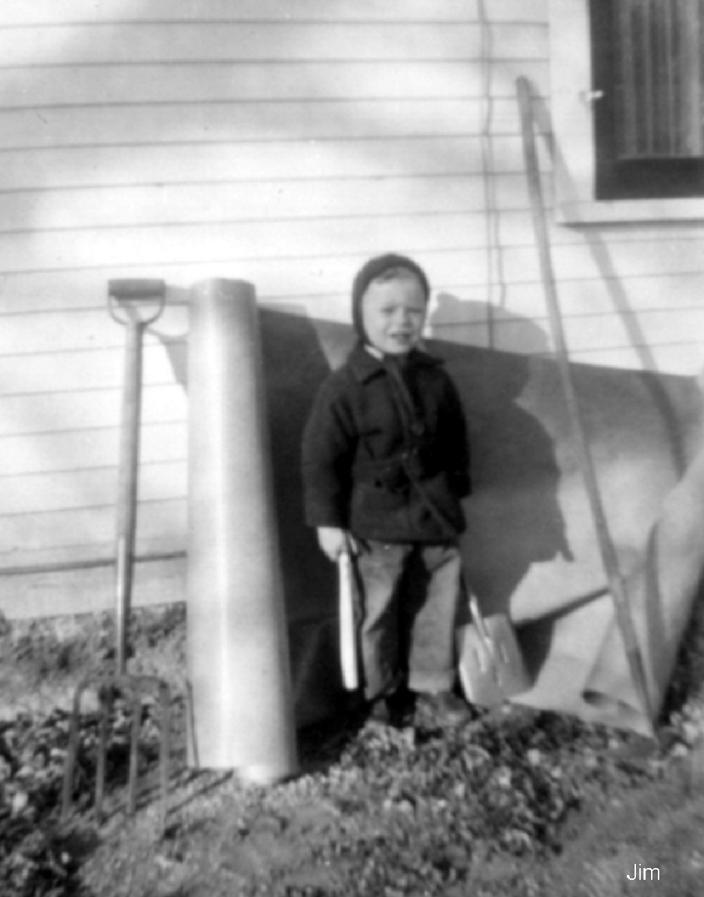 Jim-Hildebrand-Family-History/1024x768_1950-Jim-Helping.jpg
