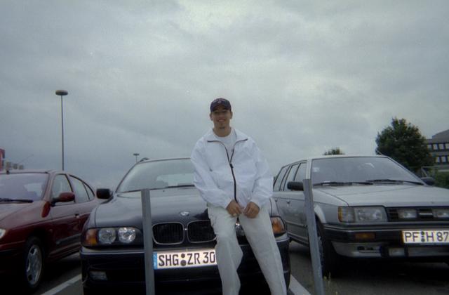 2000/07(July)/Germany-Trip/640x480_Michael_in_front_of_BMW_stationwagon.jpg