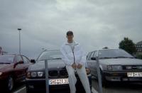 Michael_in_front_of_BMW_stationwagon.jpg