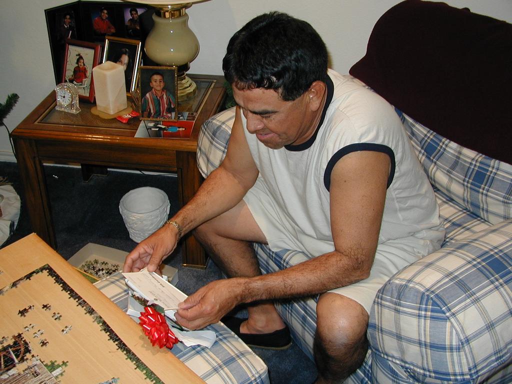 2000/12(December)/Christmas-at-Corpus/1024x768_Dad-opening-gift.jpg