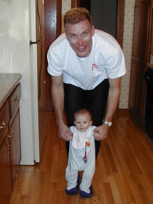 2000/04(April)/Colorado_Ski_Trip/640x480_2000-04-04-Chance-walking-on-Travis-feet.jpg