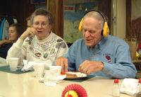 2000-10-28-38-Church-Basement-Turkey-Dinner-GrampScott-Listening-to-Football-game.JPG