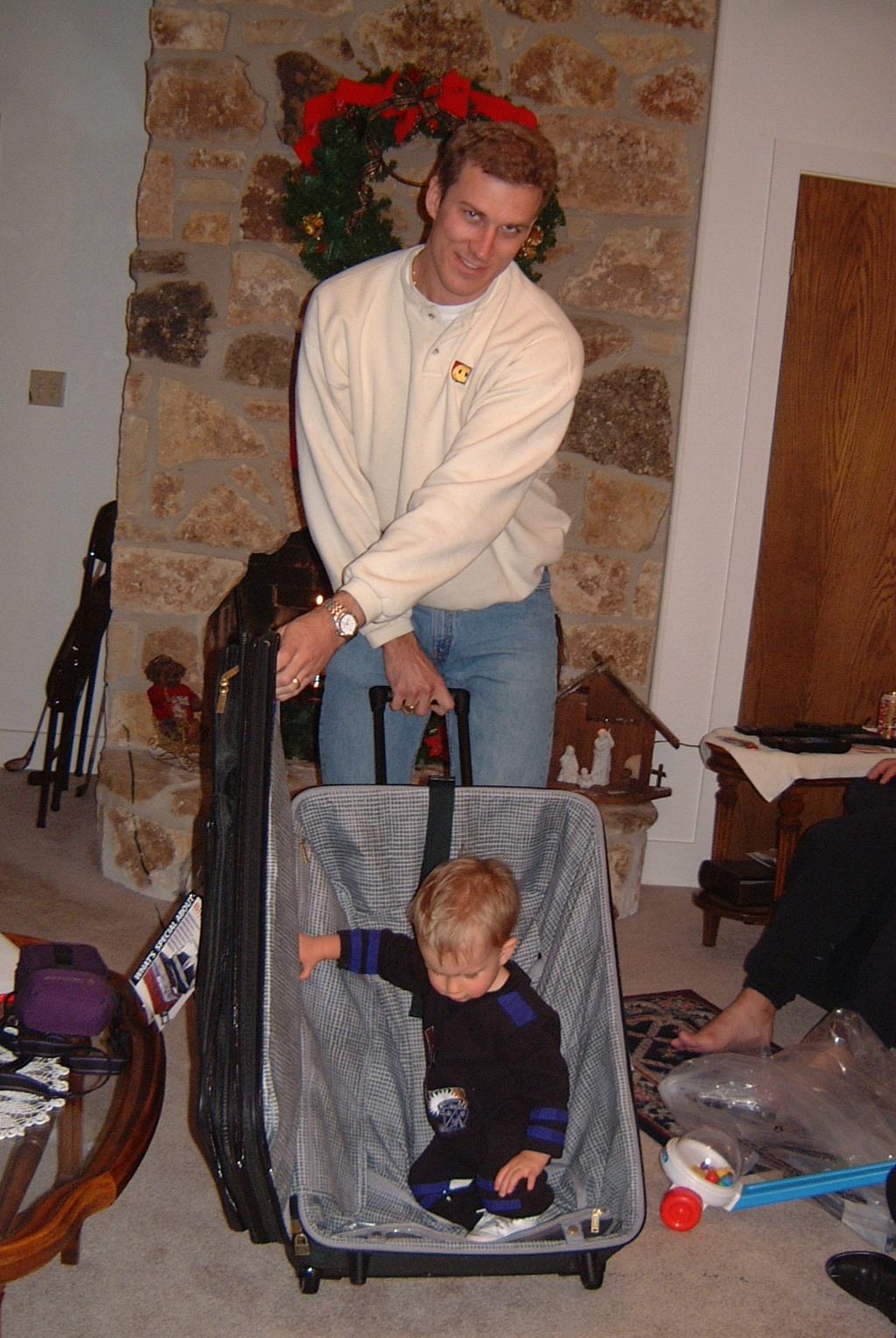 2000/12(December)/Family_Christmas_Fun/1024x768_2001-01-01-12_Chance_in_new_suitcase.JPG