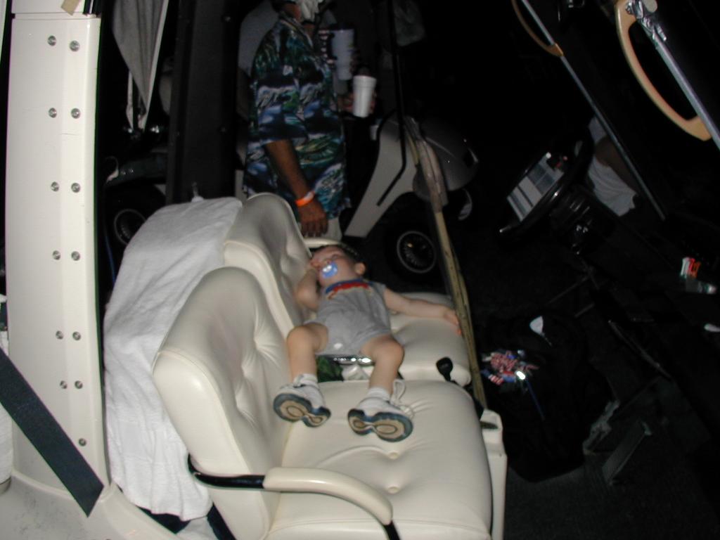 2002/07(July)/02(Lost-Creek-Picnic)/1024x768_2002-07-20-LCCC-35-Dax-sleeping-in-golfcart.JPG