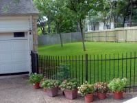 3309-TOC-05-BackYard-Peek-From-Driveway.jpg