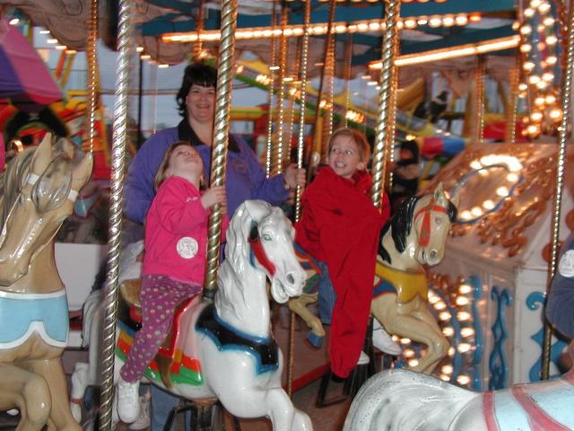 2002/03(March)/Rodeo/640x480_Kim_Megan_Jack_Carosel.JPG