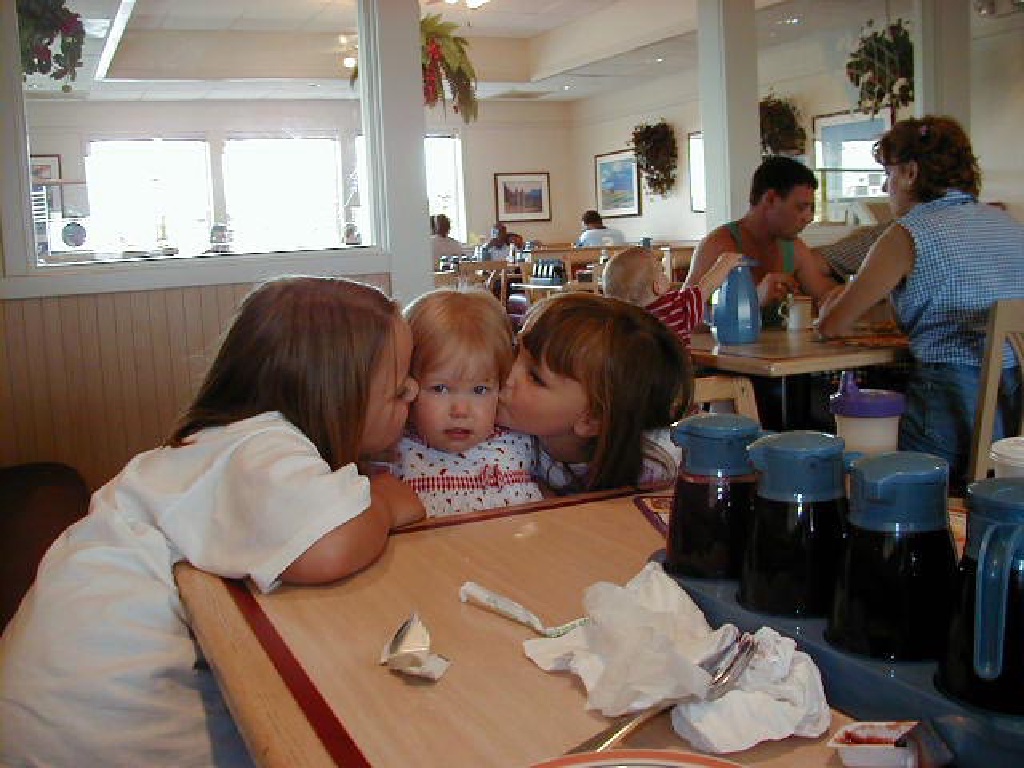 Emily-and-Sarah-kiss-Brittney.jpg
