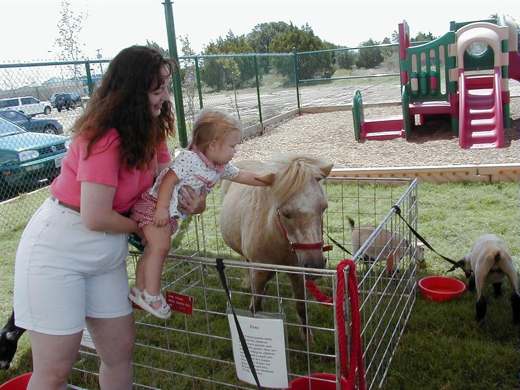 camera/1999/07(July)/07_10_Primrose_Opening/1024x768_Brittney-pets-pony.jpg