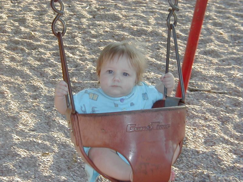 camera/1999/10(October)/10_03_At_the_park/McKenzie_swings.JPG