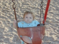 camera/1999/10(October)/10_03_At_the_park/McKenzie_swings.JPG
