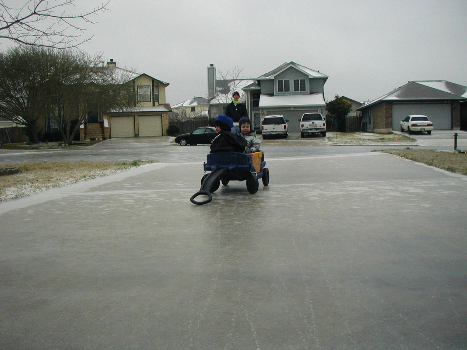 2003-02-25-Frozen-Austin-08-Chance-Dax-Travis-wagon.JPG