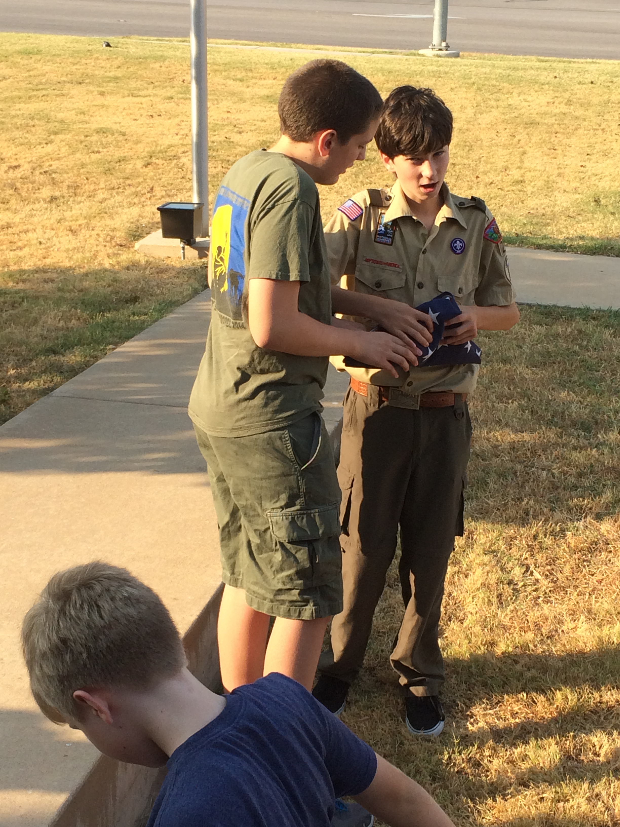 2015-08-17-Troop214-Pflugerville-Fire-Station-4-folding-retired-flags-Case-Dax.JPG