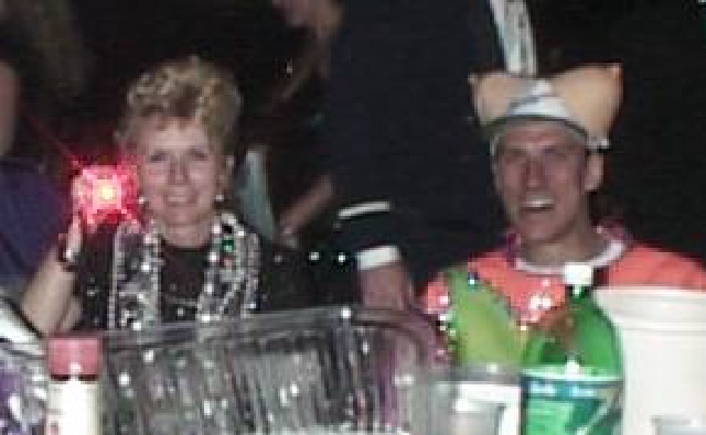 1999/02(February)/Mardi-Gras/640x480_1999-02-Ext-Mom-Laser-Travis-at-table.jpg