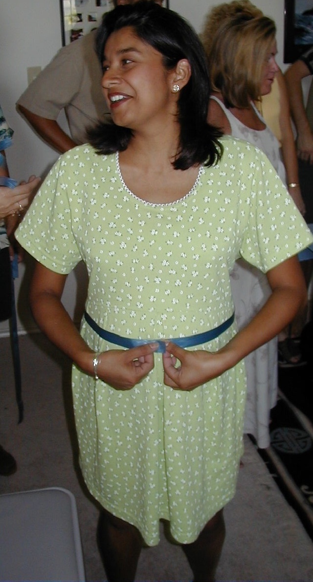 1999_08_Shower_Kavita_measures_waist.jpg