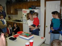 2000-12-02-Aaron-Bday-04-Kitchen-Kim-Aaron-cake.jpg