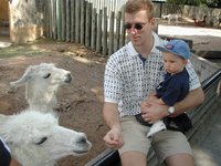 2000-12-27-Argentina-Travis-Chance-feeing-llamas-Zoo-16.JPG