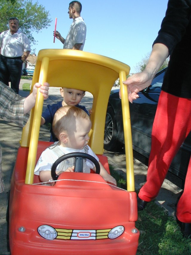 2001-03-04-Vale-1st-Bday-23-Chance-pushing-Vale-in-car.jpg