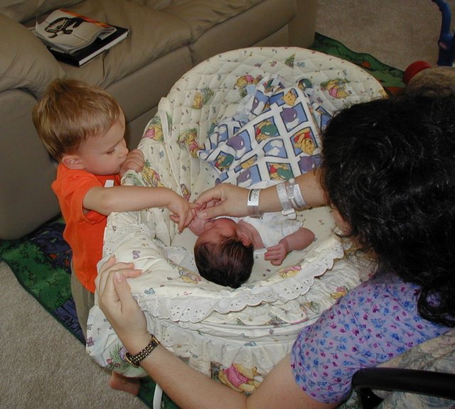 2001-05-10-24-Suzi-Dax-Chance-finger-touch.jpg