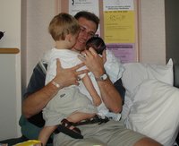 2001-05-08-14-Travis-Chance-Dax-big-hug.jpg