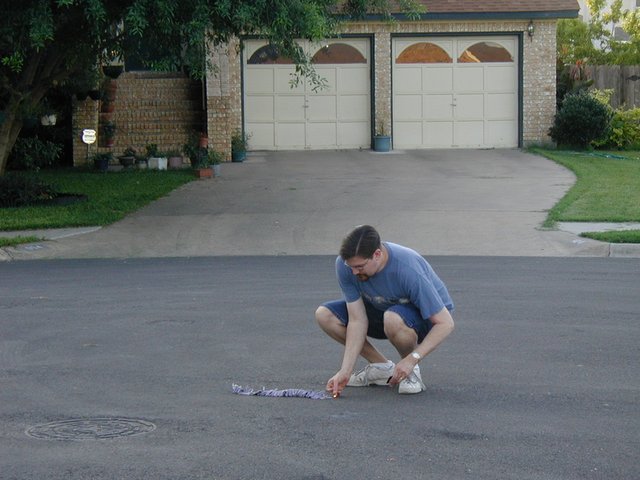 2001-07-04-11-fireworks-Matt-lighting-firecrackers.jpg