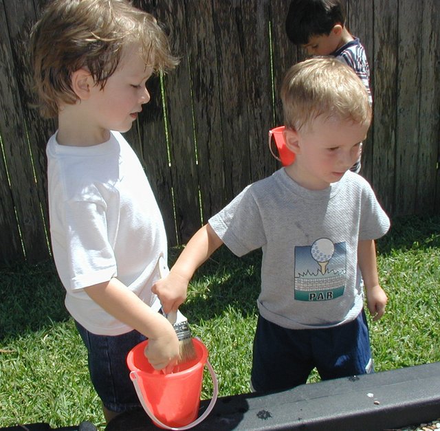 2001-07-07-Patrick-bday-14-Chance-Aaron-dipping-paintbrush.jpg