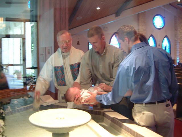 2001-08-18-Dax-Baptism-08-FatherTom-Travis-Dax-Josh-water.jpg