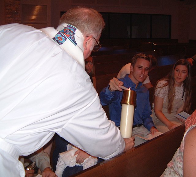 2001-08-18-Dax-Baptism-12-FatherTom-Josh-Karen-lighting-candle.jpg