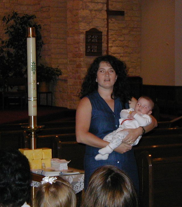 2001-08-18-Dax-Baptism-19-Suzi-Dax-Candle.JPG