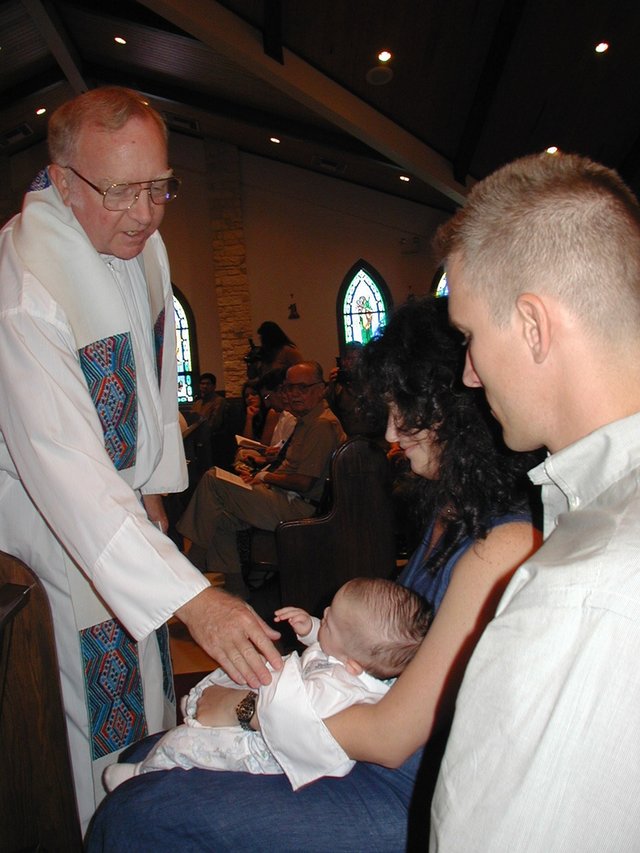 2001-08-18-Dax-Baptism-31--FatherTom-Dax-Suzi-Travis.JPG