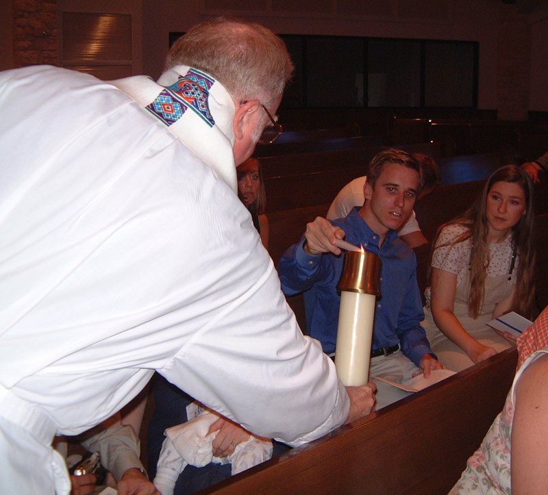 2001-08-18-Dax-Baptism-12-FatherTom-Josh-Karen-lighting-candle.jpg