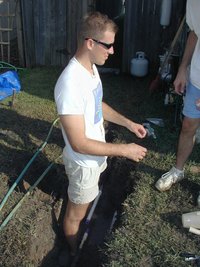 2001-09-03-Travis-fixing-broken-water-pipe-Labor-Day-5.JPG