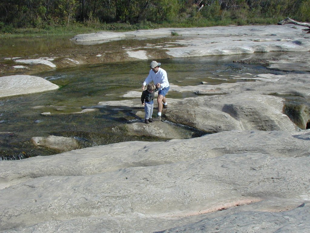 2001-10-26-Camping-McKinney-Falls-18-Jim-Aaron-crossing-falls.JPG