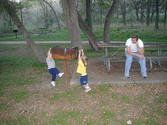 2001-10-25-Camping-McKinney-Falls-7-Vale-Chance-hanging-on-grill-Justin.JPG