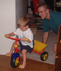 2001-10-05-Chance-Bday-07-Chance-Travis-Tricycle.JPG