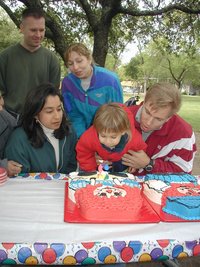 2001-10-06-Kalyani-Bday-07-Kavita-Kevin-Sara-Kalyani-Ben-cake.JPG