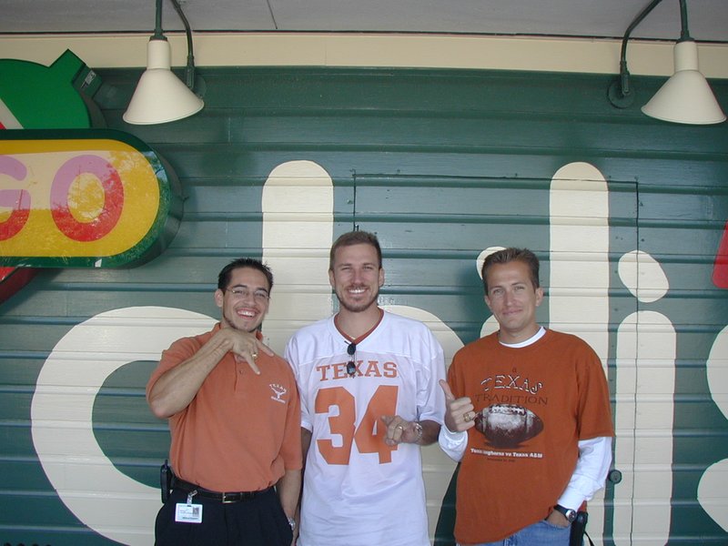 2001-11-30-Aggies-lost-bet-wearing-burnt-orange-3-Mike-Travis-Ryan.JPG