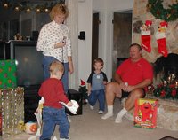 2001-12-24-Xmas-eve-15-Vale-Chance-cleaning-paper-Janeen-Jim.JPG