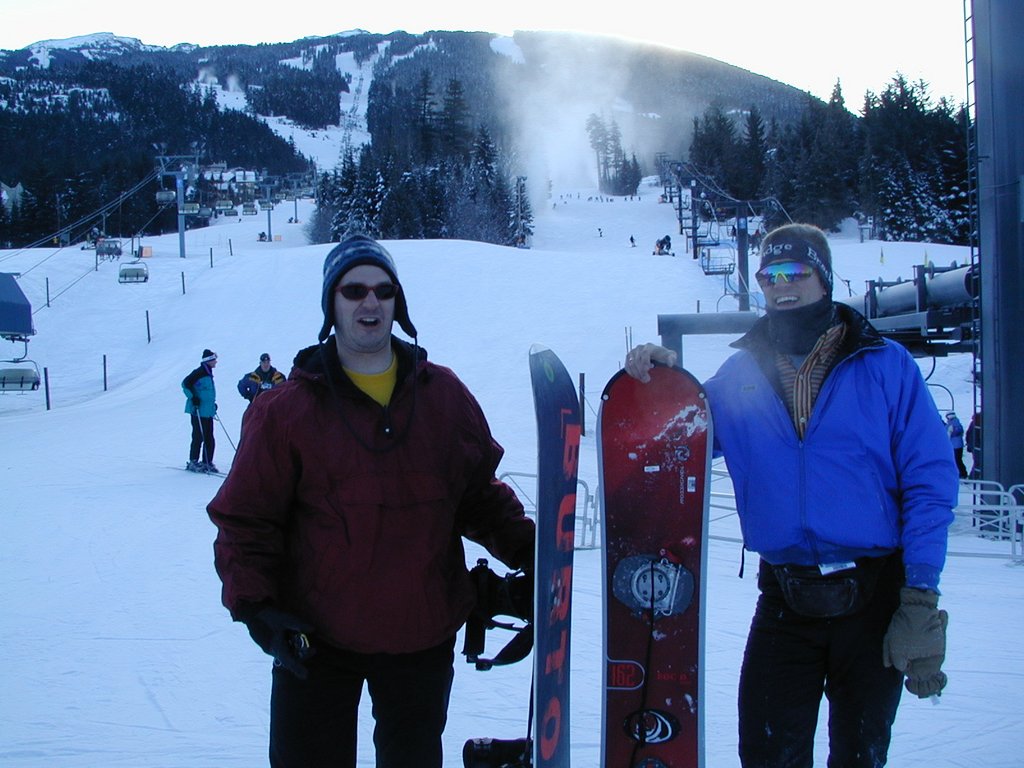 2001-02-12-Whistler-3-Justin-Travis-with-boards-at-base-of-Blackcomb.JPG