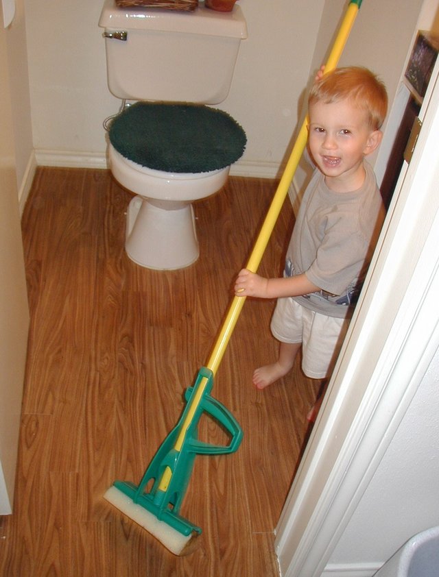 2001-07-06-4-Chance-mopping-bathroom.jpg.jpg