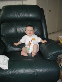 2001-11-12-Dax-in-Daddys-chair-2.JPG