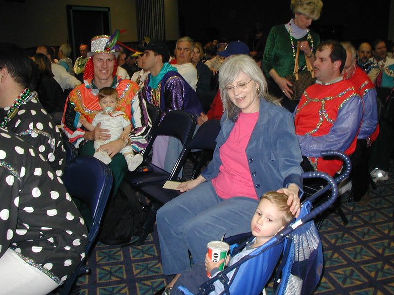 2002-02-09-06-preparing-for-parade-Travis-Dax-Susana-Chance-at-church.JPG