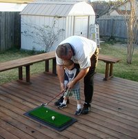 2002-02-23-4-Chance-golfing-Jim.JPG