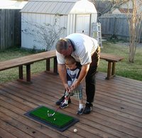 2002-02-23-5-Chance-golfing-Jim.JPG