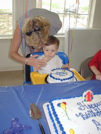 2002-05-05-Dax-Bday-22-eating-cake-Janeen.JPG