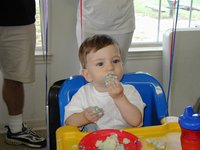2002-05-05-Dax-Bday-31-eating-cake.JPG