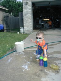 2002-05-27-5-Dax-Chance-washing-car-sunglasses.JPG