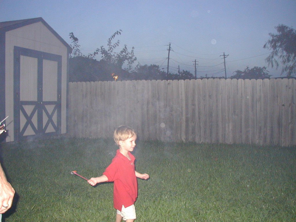 2002/07(July)/4th-of-July/1024x768_2002-07-03-Chance-sparkler-2.JPG