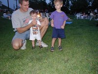 2002-07-04-04-Travis-Chance-Dax-sparkler.JPG