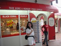 2002-08-08-10-Grand-Cayman-Suzi-bought-gold-anklet.JPG